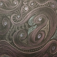 swirly drawing on black paper